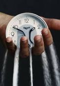 clock-slipping-through-fingers
